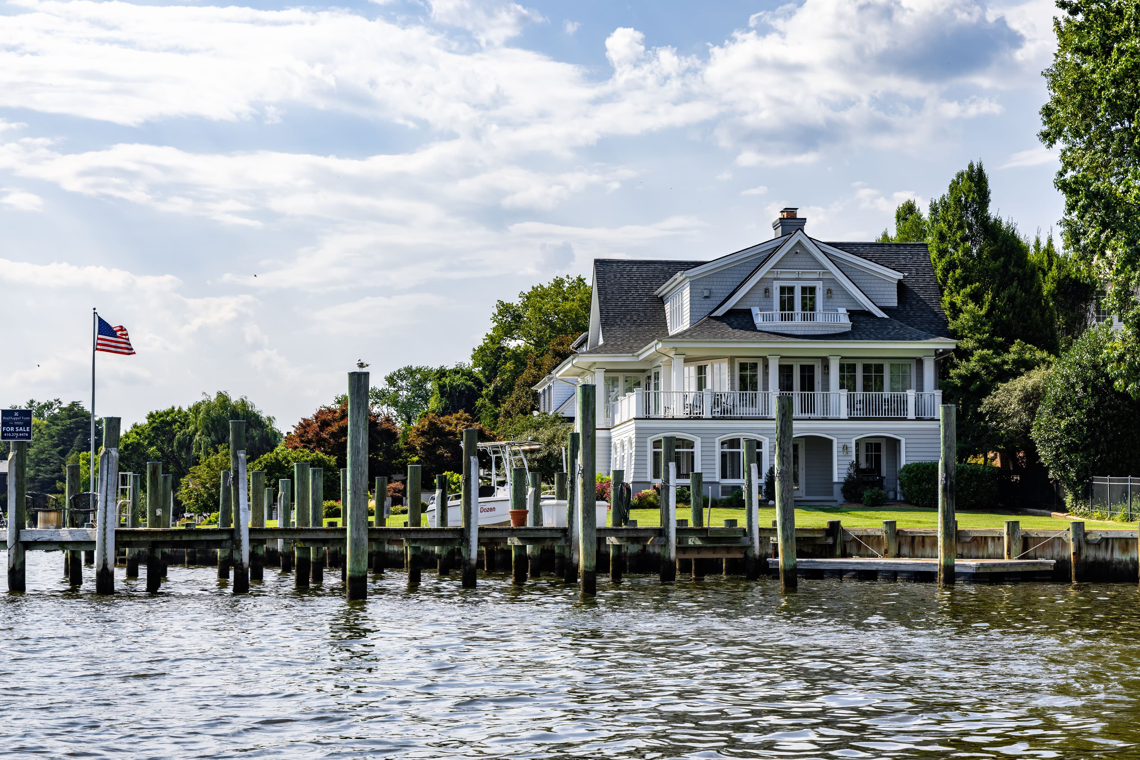 Waterfront coastal home with a private dock